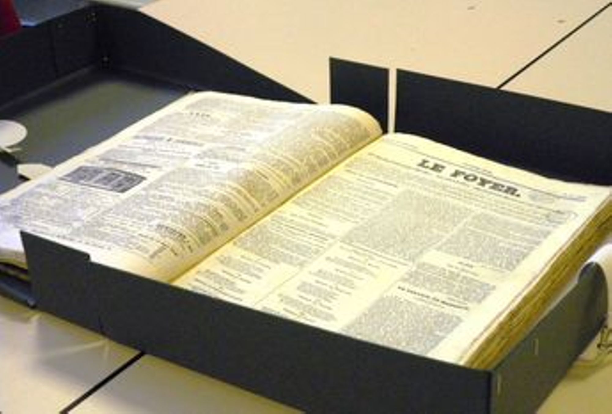 Boite de conservation à plat de la presse